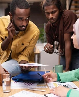 Group of students working on scholarship applications