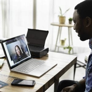 A virtual session of a mentee consulting with a mentor on scholarship advice