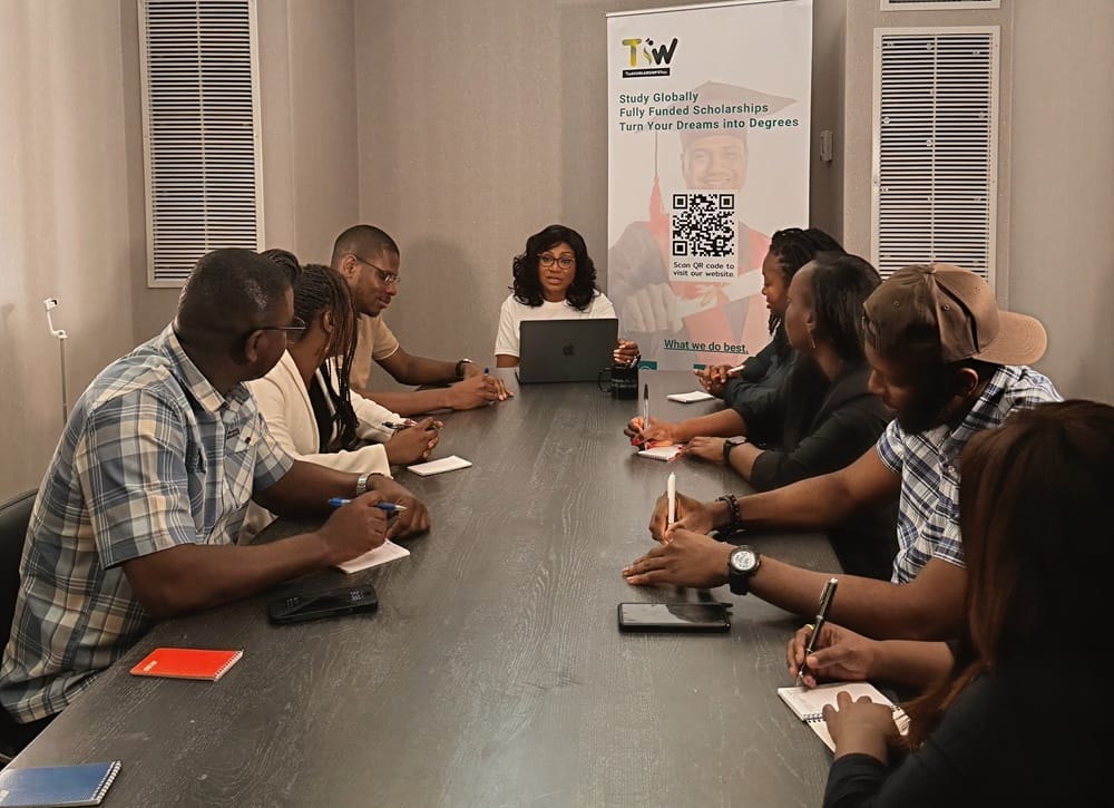The founder of The Scholarship Whizz coaching a group of students