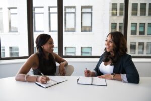 A mentor and mentee one on one in scholarship coaching